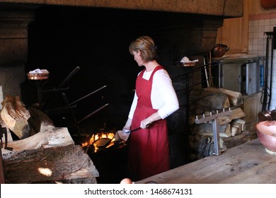 Avranches, France - Sep 23, 2016: A Female Chef Is Baking The World Famous Omelette At Wood Fire In A Restaurant At The Mont Saint-michel