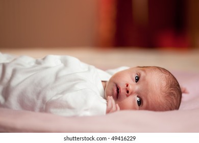 Awake Little Newborn In The Room