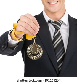 Award Businessman. Business success businessman holding gold medals