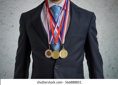 Awarded Businessman Is Wearing Many Medals.