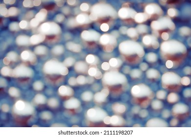 Awe beautiful christmaslight twinkly blue color dust glitz card copyspace area. Bright glittery de focus art soft sphere shape. Close-up view with space for text on dark gray merry xmas glowball scene