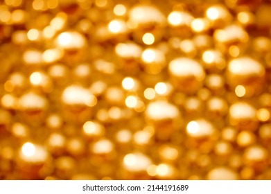 Awe beautiful christmaslight twinkly copper color dust glitz card copyspace area. Bright glittery de focus art soft sphere shape. Close-up view with space for text on gold merry xmas glowball scene