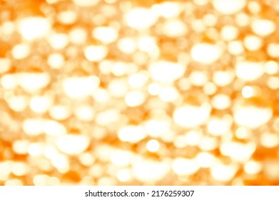 Awe beauty christmaslight twinkly orange color dust glitz card copyspace area. Bright glittery de focus art soft sphere shape. Close up view text space gold merry xmas sun glowball scene design card
