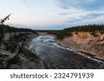 Awe Inspiring Louise Falls crashes through Twin Falls Gorge Provincial Park in Northwest Territories, Canada