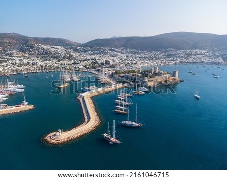 Awesome aerial view of Bodrum Marina and Bodrum Castle in Turkey. The port city is a popular tourist destination in the Turkish Riviera.
