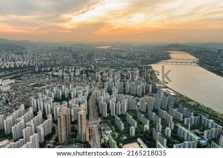 Awesome aerial view of Seoul at sunset, South Korea. Amazing cityscape. Seoul is a popular tourist destination of Asia.