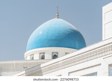 Awesome blue dome of Minor Mosque in Tashkent, Uzbekistan. The amazing white mosque is a popular tourist attraction of Central Asia.