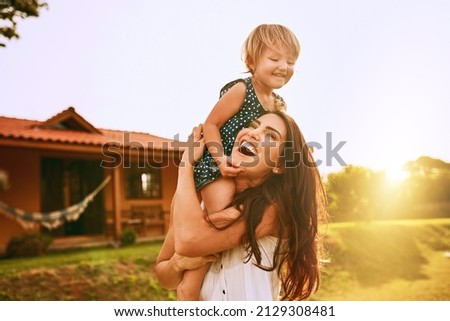 Its an awesome day when we remember to play. Cropped shot of a young family spending time together outdoors.