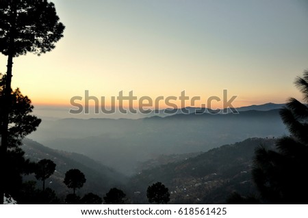 Awesome foggy mountain during sunrise