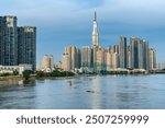 Awesome Ho Chi Minh City skyline. Amazing view of a skyscraper and other high-rise buildings across the Saigon River in Ho Chi Minh City, Vietnam. Saigon is a popular tourist destination of Vietnam.