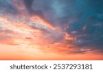 Awesome sunset and soft pink clouds of pastel tones. Image template of textured sky. Gorgeous photo wallpaper. Bright epic sky. Dramatic evening light and fiery orange sunset. Beauty of earth.