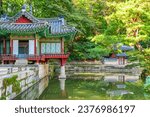 Awesome view of Buyongjeong Pavilion and Buyeongji Pond in Huwon Secret Garden of Changdeokgung Palace in Seoul, South Korea. The garden is a popular tourist attraction of Asia.