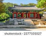 Awesome view of colorful pavilion in Huwon Secret Garden of Changdeokgung Palace in Seoul, South Korea. Traditional Korean palatial architecture. The garden is a popular tourist attraction of Asia.