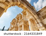 Awesome view of the Gate of Augustus and the Library of Celsus in Ephesus (Efes). Ruins of the ancient Greek city in Selcuk, Izmir Province, Turkey. Ephesus is a popular tourist attraction in Turkey.