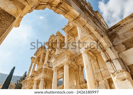 Awesome view of the Gate of Augustus and the Library of Celsus in Ephesus (Efes). Ruins of the ancient Greek city in Selcuk, Izmir Province, Turkey. Ephesus is a popular tourist attraction in Turkey.