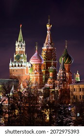 Awesome view of highlighted St. Basil's Cathedral at winter Red Square with dark night sky. Moscow city downtown, kremlin towers, architecture of Russia capital. St. Basil's Cathedral, Moscow, Russia