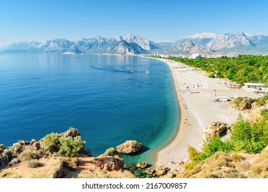 Awesome view of Konyaalti Beach and Park in Antalya, Turkey. Drone flying over the beach. Konyaalti Beach is a popular tourist attraction in Turkey. - Powered by Shutterstock