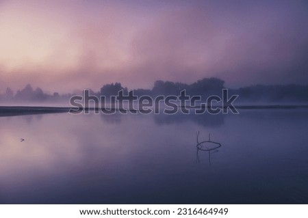 Awesome View of Lake with Dark Purple Colored Foggy Climate
