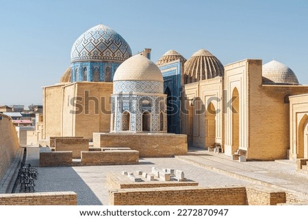 Awesome view of the Shah-i-Zinda Ensemble in Samarkand, Uzbekistan. Mausoleums decorated by blue tiles with designs. The necropolis is a popular tourist attraction of Central Asia.