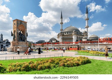 Awesome view of the Taksim Mosque and the Republic Monument at the Taksim Square on sunny day. The public square is a popular tourist destination.