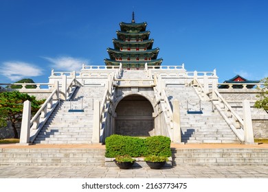 Awesome view of tower with blue tile roof of the National Folk Museum of Korea. Beautiful building of traditional Korean architecture at the Gyeongbokgung Palace area in Seoul, South Korea.