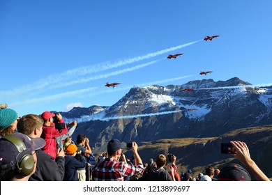 AXALP, SWITZERLAND - OCTOBER 10, 2018: Northrop F-5E Tiger II Patrouille Suisse aerobatics team of Swiss air force during Axalp 2018 airshow at shooting range in Swiss Alps.