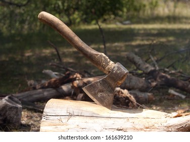Axe in log