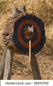 Axe In The Target At A Lumberjack Axe Throwing Competition