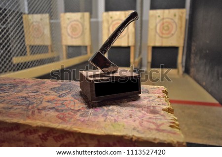 Axe throwing trophy on display at an indoor axe throwing hall that holds competitions for both recreational and competitive leagues.