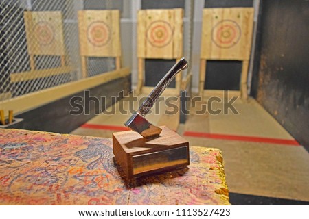 Axe throwing trophy on display at an indoor axe throwing hall that holds competitions for both recreational and competitive leagues.