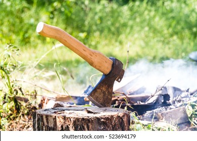 Axe In The Tree And Nature