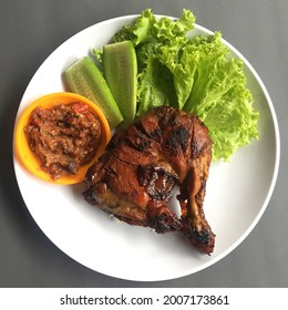 Ayam bakar is an Indonesian and Malaysian dish, consisting of charcoal-grilled chicken. Ayam bakar literally means “roasted chicken” in Indonesian and Malay.