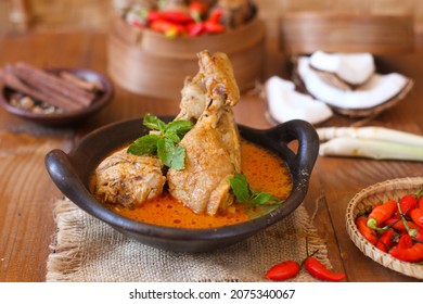 Ayam GuAyam Gulai Padang. A popular dish of chicken curry from Padang, West Sumatralai Padang. A popular dish of chicken curry from Padang, West Sumatra