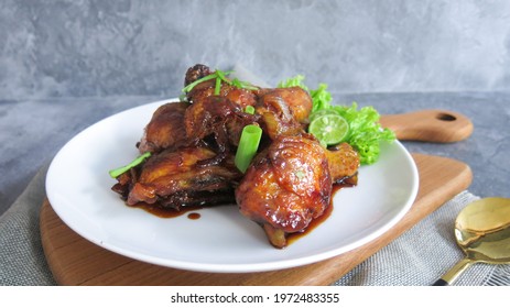 Ayam kecap or Chicken with sweet soy sauce is an Indonesian home-cooked meal with Chinese influence 