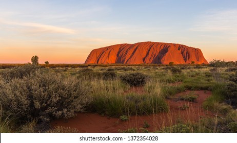 Ayers Rock Red Center Australia 10 09 2016 Sunset on the mythical rock of Central Australia  - Shutterstock ID 1372354028