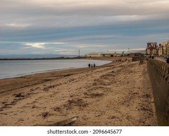 Ayr, South Ayrshire, Scotland - December 25th 2021: People Out Walking On Ayr Beach Christmas Day.