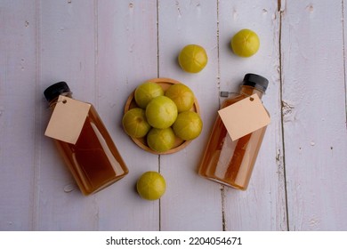 Ayurvedic Amla Or Indian Gooseberry Juice, Healthy Diet On Wood Table