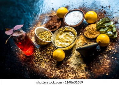 Ayurvedic Face Pack Or Ubtan Of Moong Dal Or Green Lentil Or Mung Dal With Lemon,dried Orange Peel Powder,chandan Powder Or Sandal Wood Powder ,milk, Rose Water And Aloe Vera Gel On Wooden Surface.