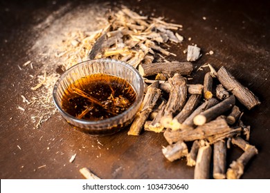 Ayurvedic Herb Liquorice Root,Licorice Root, Mulethi Or Glycyrrhiza Glabra Root And Its Powder With Its Tea For Detoxifying The Body, Soothing Spasms, Easing Menstrual Cramps, Raising Blood Pressure.