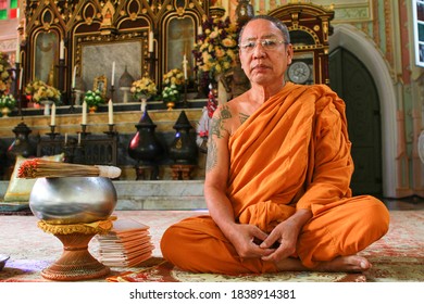 Ayutthaya, Thailand - 07/01/2014: A Buddhist Monk Sitting In The Lotus Position.