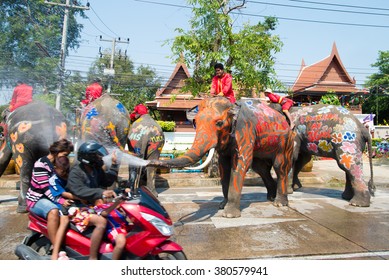 AYUTTHAYA, THAILAND - APR 14:  Revelers enjoy water splashing with elephants during Songkran Festival on Apr 14, 2015 in Ayutthaya,Thailand.  Water splashing is the way Thai people celebrate New Year.