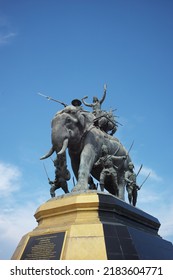 Ayutthaya, Thailand - July 28, 2022: Queen Suriyothai Monument, That Depicts A Fierce Looking King Maha Chakkraphat On His War Elephant, Surrounded By Siamese Soldiers With Clouds And Blue Sky.