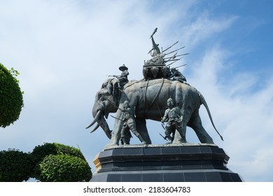 Ayutthaya, Thailand - July 28, 2022: Queen Suriyothai Monument, That Depicts A Fierce Looking King Maha Chakkraphat On His War Elephant, Surrounded By Siamese Soldiers With Clouds And Blue Sky.