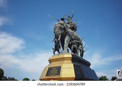 Ayutthaya, Thailand - July 28, 2022: Queen Suriyothai Monument, That Depicts A Fierce Looking King Maha Chakkraphat On His War Elephant, Surrounded By Siamese Soldiers With Clouds And Blue Sky.