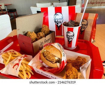 Ayutthaya,Thailand - Apr 06,2022: KFC Hamburger and Fried Chicken set at fast food restaurant Kentucky Fried Chicken (KFC) is a large restaurant chain. At Big C, Wangnoi branch in Thailand - Asia.