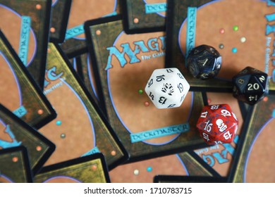 AYUTTHAYA,THAILAND-APRIL 22, 2020 : MAGIC THE GATHERING GAME CARD BY WIZARD CO., LTD, MTG CARD BACKGROUND AND DICES ACCESSORIES FOR PLAY