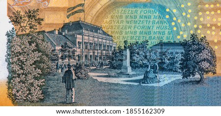 Az Ideiglenes Magyar Kepviselohaz Pesten (The Provisional Assembly of Hungary in Budapest) building with flag, trees, strolling couples, and statue of bust. Portrait from Hungary Banknotes.  Stock fotó © 