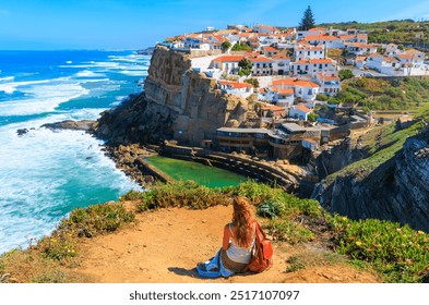 Azenhas do Mar, back view of woman tourist in Sintra, Portugal - Powered by Shutterstock