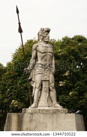 Aztec Warrior Stone Statue in Antigua Guatemala