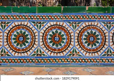 Azulejos, typical Spanish tilework decorating a bench in the Alcazar of Seville, Spain - Powered by Shutterstock